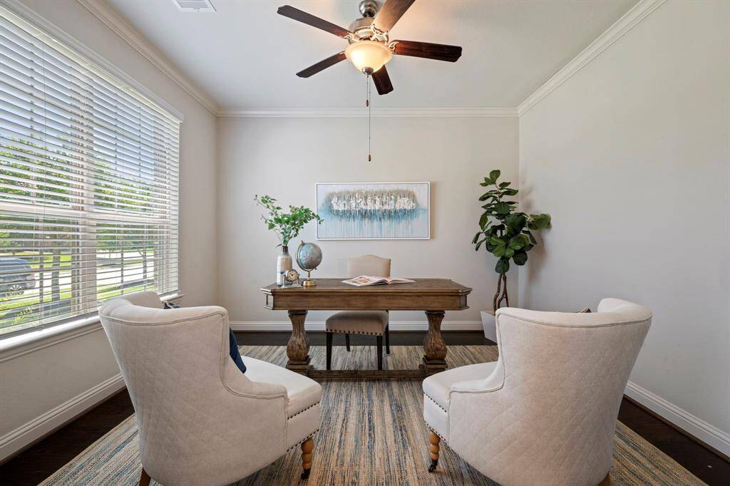Inviting home office with a large window.