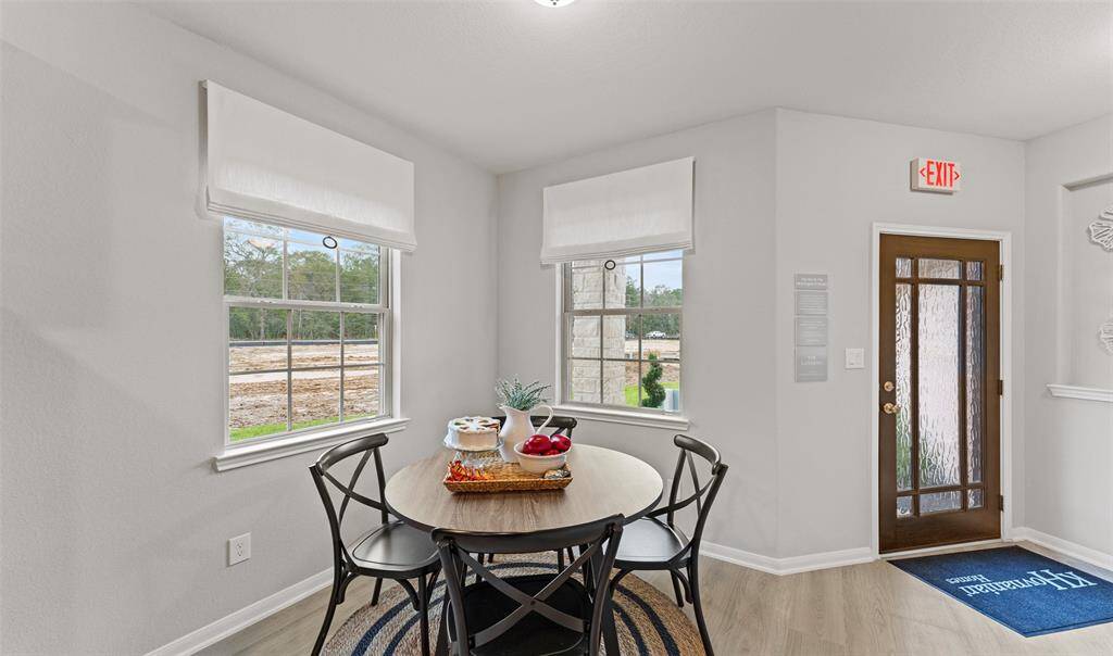 Sun-lit dining area (*Photo not of actual home and used for illustration purposes only.)