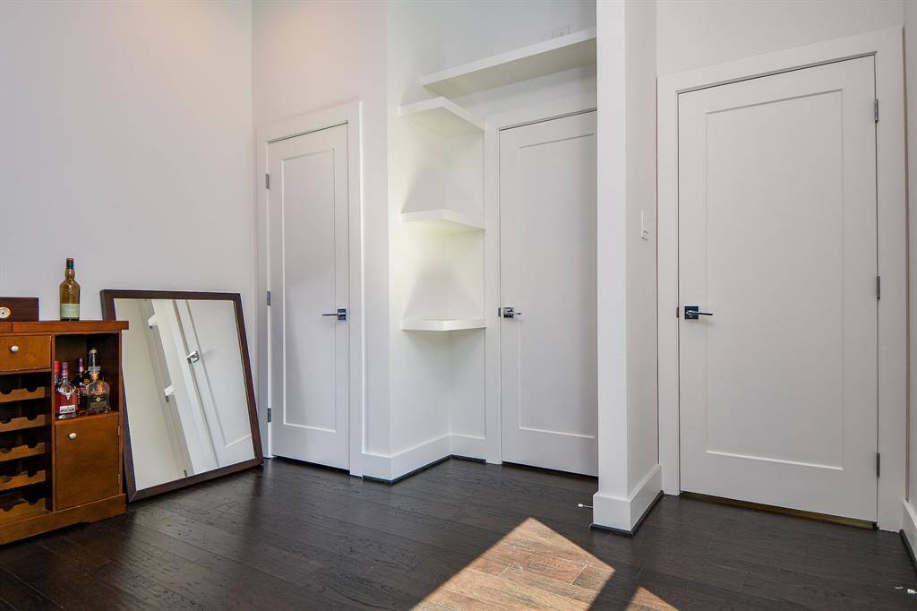 The other side of the downstairs bedroom that can easily be used as a home-office.