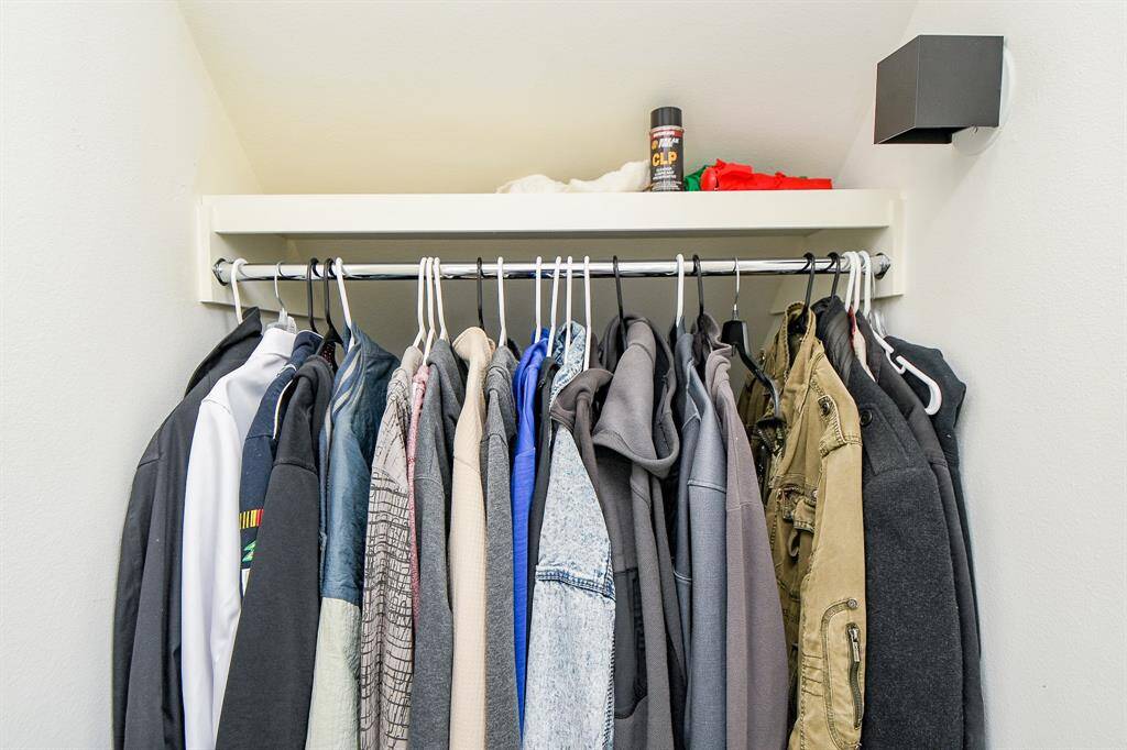 There is a huge storage area under the stairs with room to store all those winter jackets in the back.