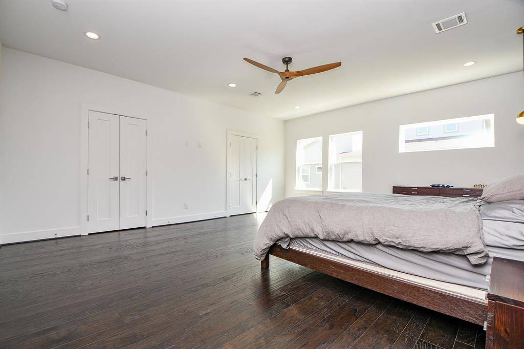 The master bedroom is absolutely huge with an ensuite bath and large picture windows.