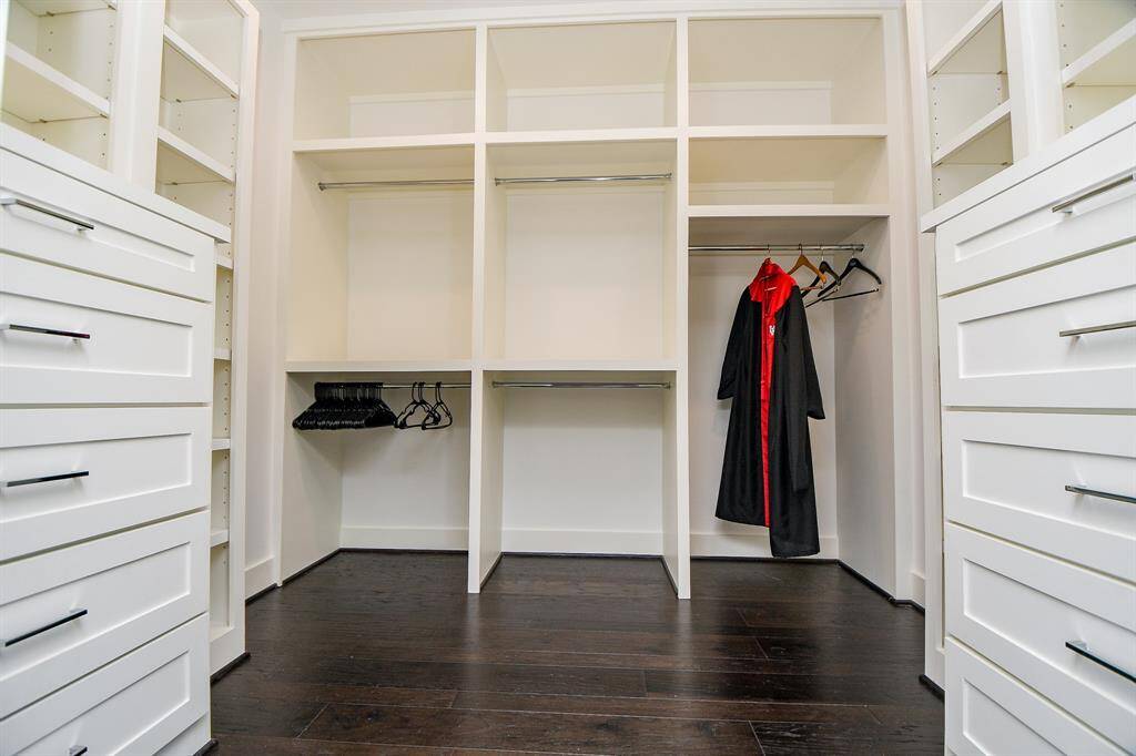 The master closet has built-in dresser drawers and enough space for everything!