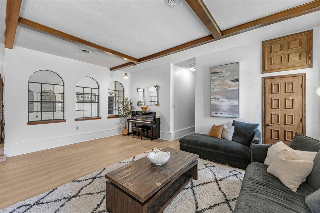 Spacious and bright with arched windows and plenty of room to relax.