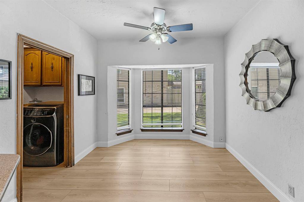 Charming breakfast nook with large bay window and great natural light.