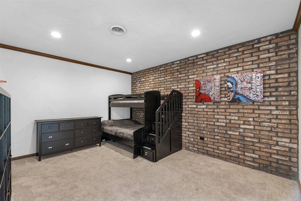 Cozy kids’ room with exposed brick