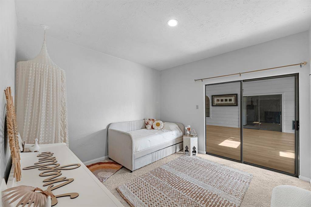 Bright and calming with access to the sunroom.