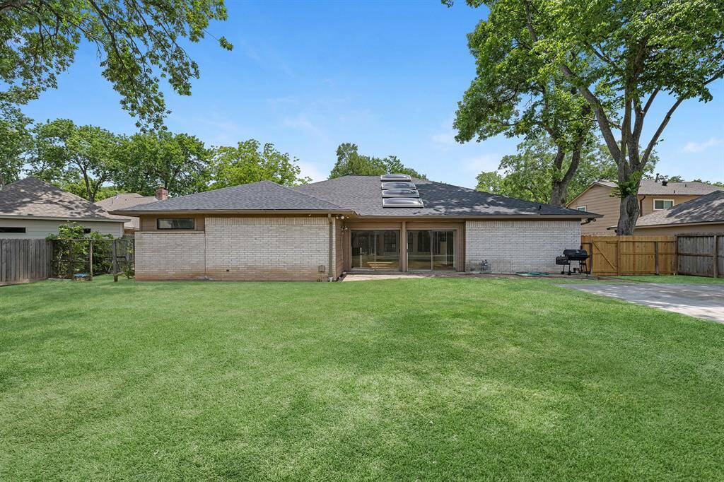 Huge backyard with lots of space to play or relax.