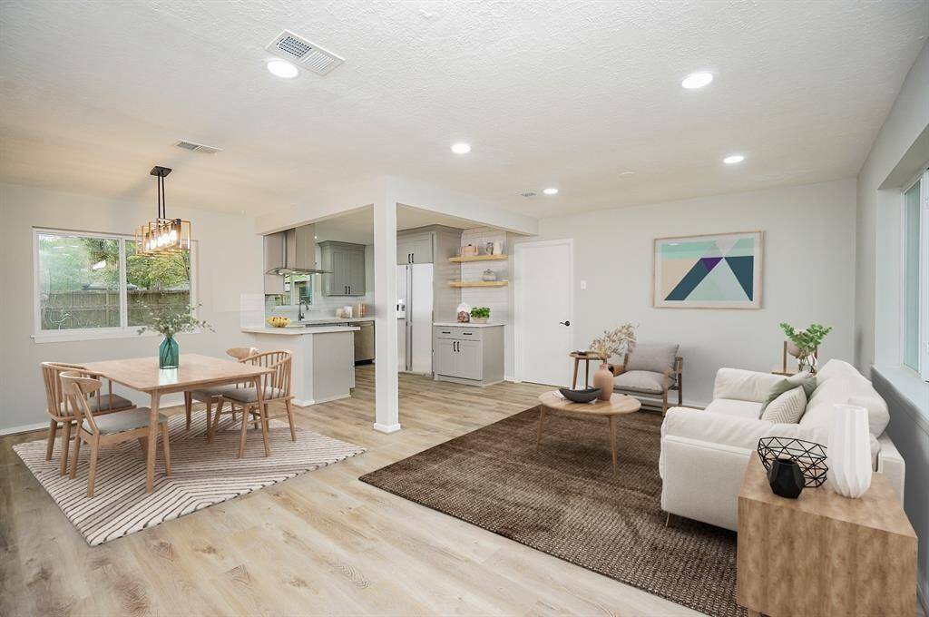 Welcome home to this beautifully remodeled home in historic Katy Heights! Open concept living with luxury vinyl plank flooring, new kitchen cabinets, new SS appliances, Quartz countertops and designer Dining Room light fixture. Virtually staged.