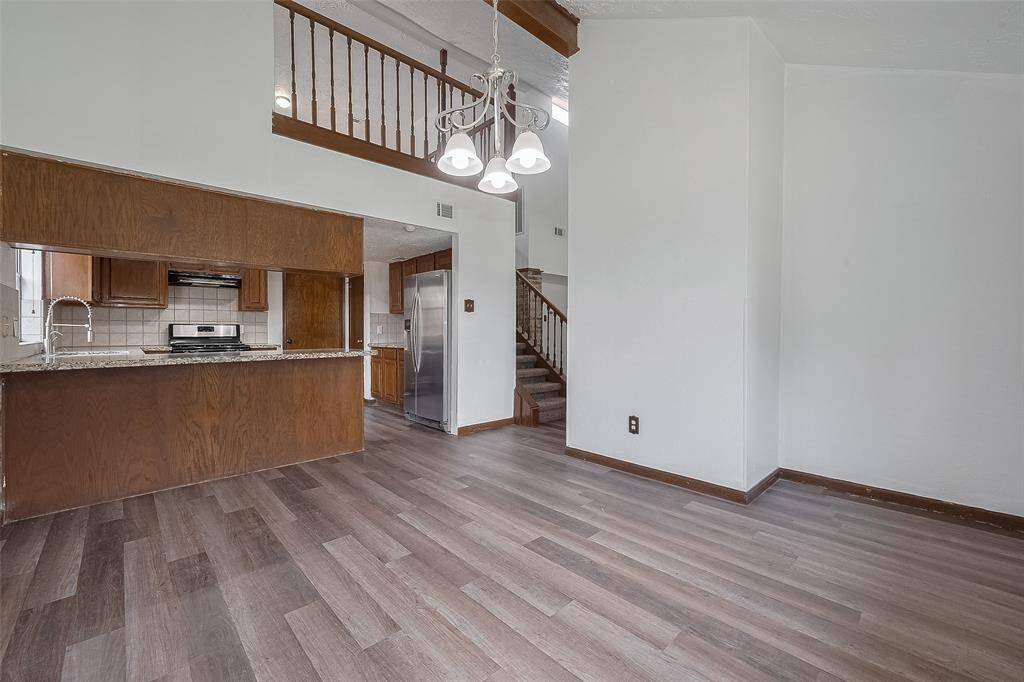 The dining space sits just off the kitchen, providing easy flow for entertaining and everyday convenience.