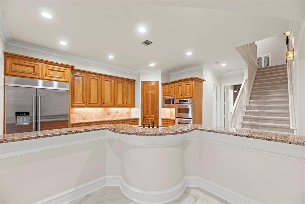 Stepping into the kitchen you are guaranteed to feel like a chef.  This space is amazing with so much counter space, lots of storage... how could you not get creative in this space?