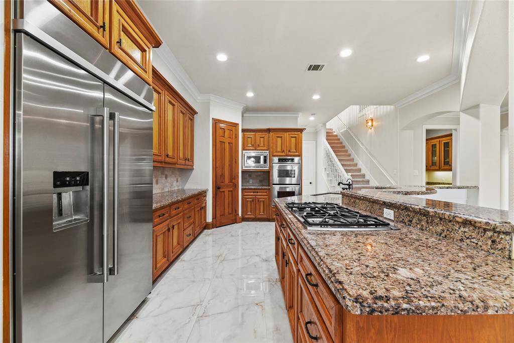 Look at all the counter space and storage this kitchen offers!  The whole family can pitch in and cook together!