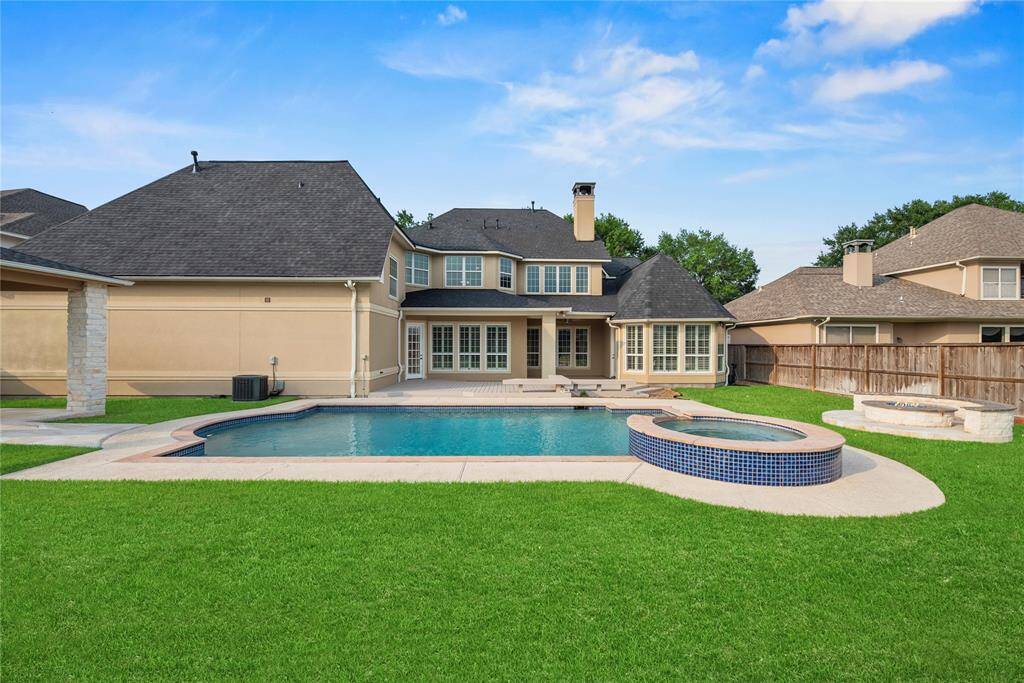 he pool and spa offer the pinnacle of leisure and indulgence, transforming outdoor playtime into an exquisite retreat of relaxation and enjoyment, while a thoughtfully designed fire pit creates a warm, inviting ambiance perfect for intimate gatherings and cozy evenings under the stars.