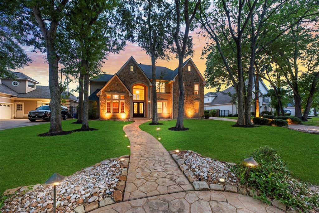 The Stamped cobblestone walkway and driveway are another statement feature to greet guests.