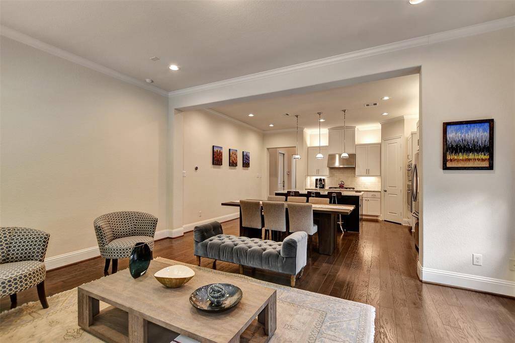 This photo showcases a bright, open-concept living area.