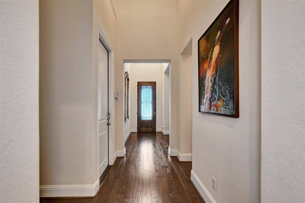 Welcome home to an inviting Foyer that exudes sophistication and charm. Its beautiful engineered hard wood floors add warmth and refinement. Step inside to this charming home.