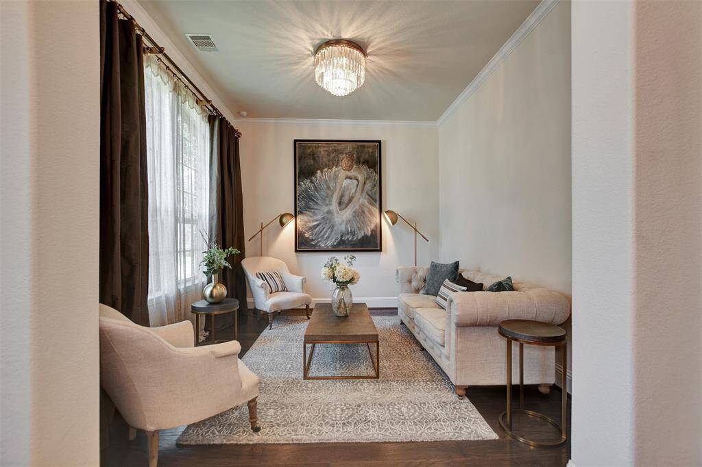Lots of natural light, soft colors add a delicate touch to this Den.
