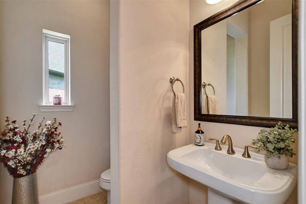 A delicated and spacious half bath is available for all your guests.