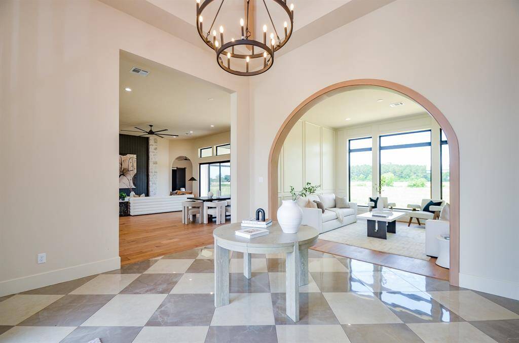 Foyer with views of formal living room and Living room.