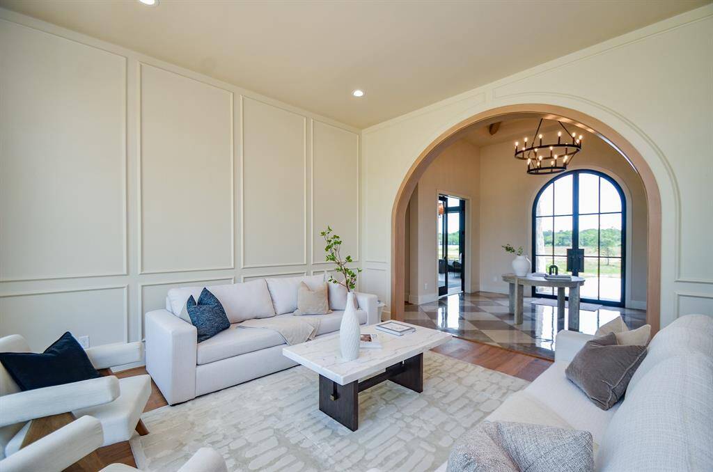 Formal living room with view of the foyer.