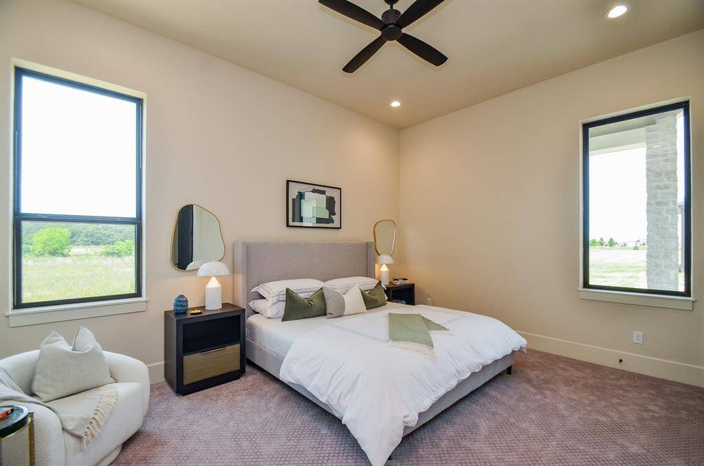 One of 3 bedrooms downstairs.  All with ensuite baths.