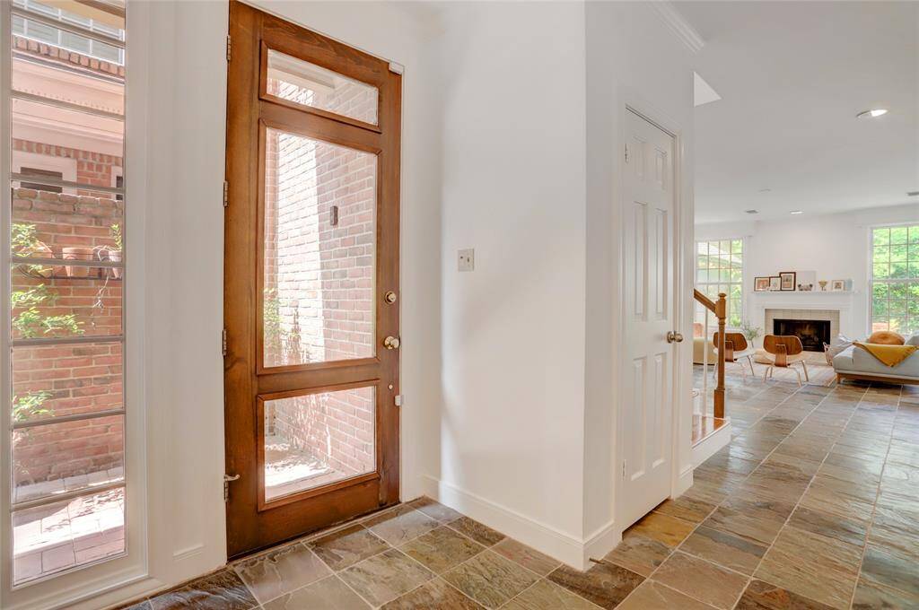 Private gated courtyard leading to the entry.