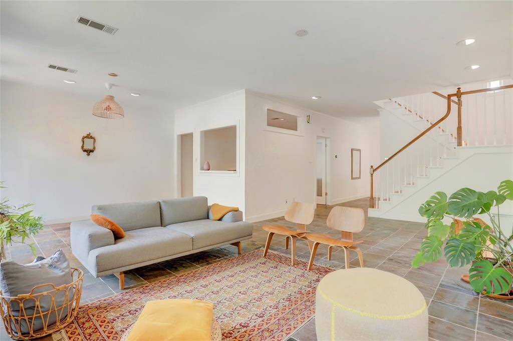 An alternate view of the living room looking toward the kitchen