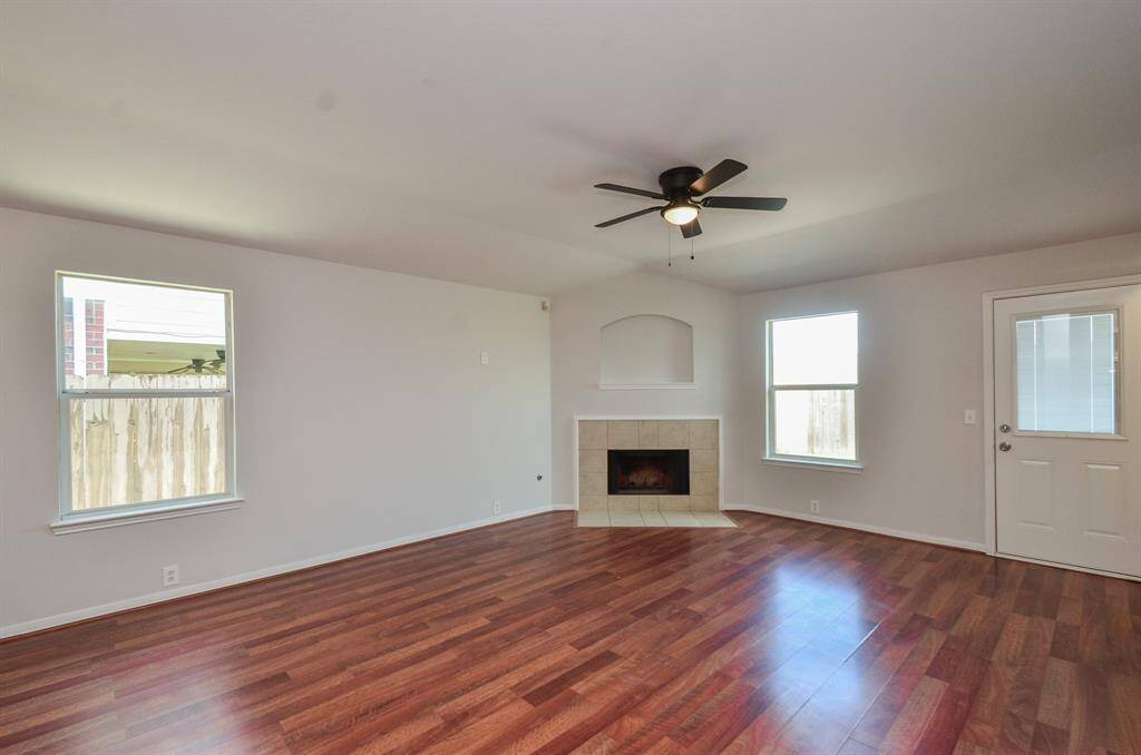 Enjoy family time in this cozy living/family area with agas fireplace ideal for those cold winter months.