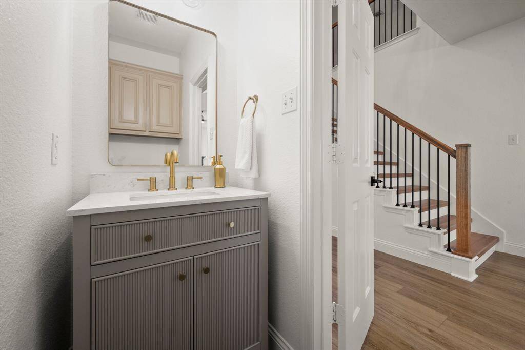 Updated half bath is handy for guests.