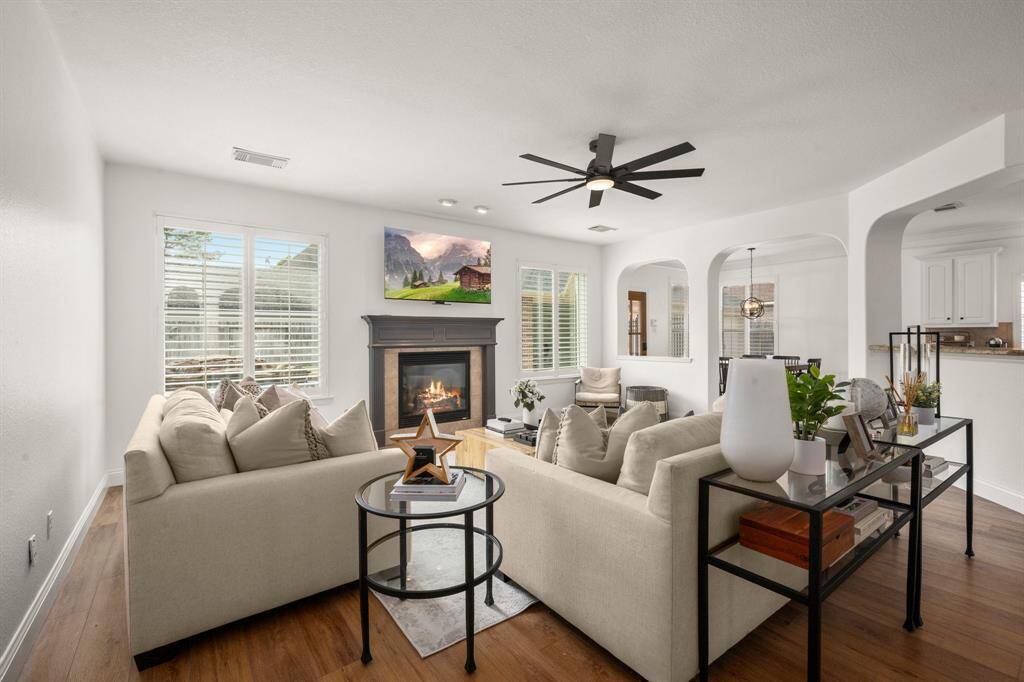 Plantation shutters throughout offer privacy and beauty.
