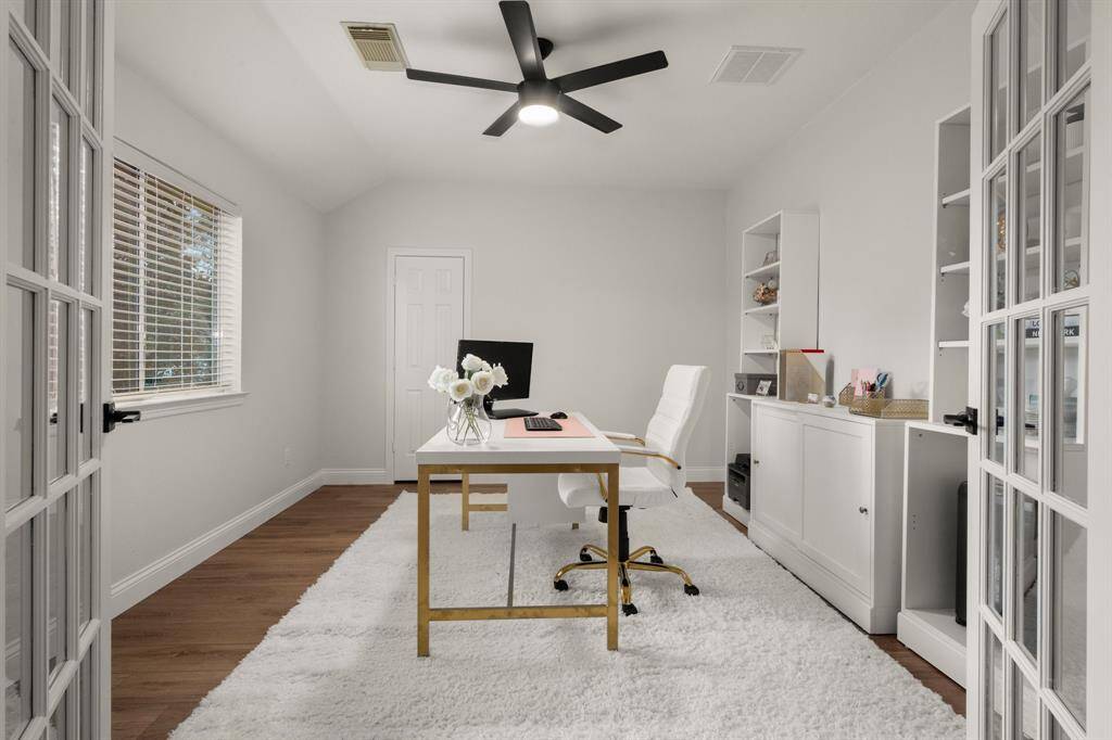 Fifth bedroom upstairs could also serve as a media room and is currently serving as a home office.
