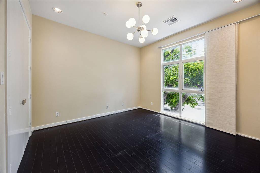 Cozy bedroom space with ample natural light.