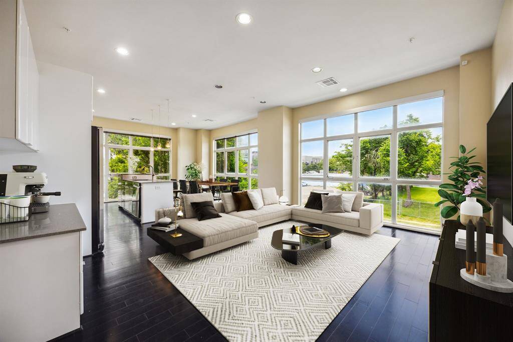 Virtually staged. Lush views of the tree lined streets from every window.