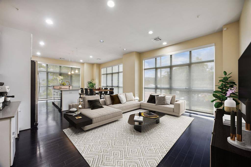 Virtually staged. Remote controlled shades in every window for owners ease.