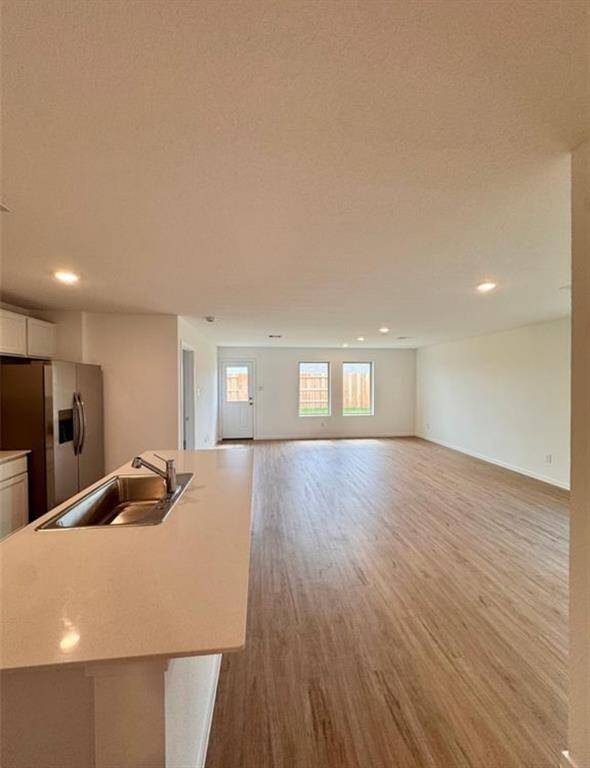 Gorgeous open concept.  Kitchen has plenty of cabinet space.