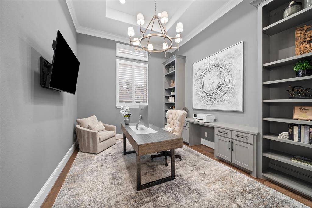 Thoughtfully designed with custom built-ins, tall ceilings, and updated paint, this elegant study offers a quiet retreat for focused work or creative pursuits.