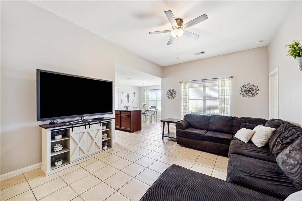 LIVING AREA IS OPEN TO KITCHEN WITH PLENTY OF SPACE FOR A MASSIVE SECTIONAL!  WHO IS READY FOR MOVIE NIGHT!?