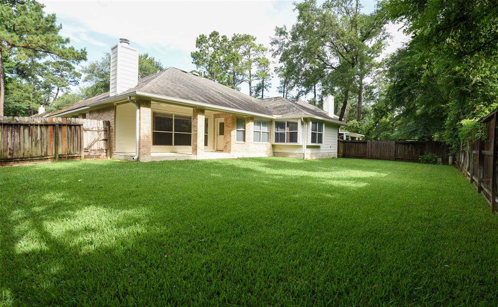 Beautiful private backyard with a covered porch
