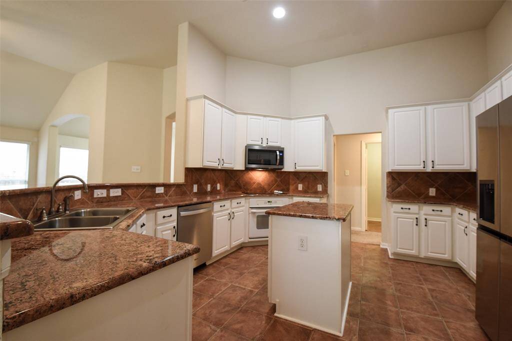 Awesome island kitchen with granite counters