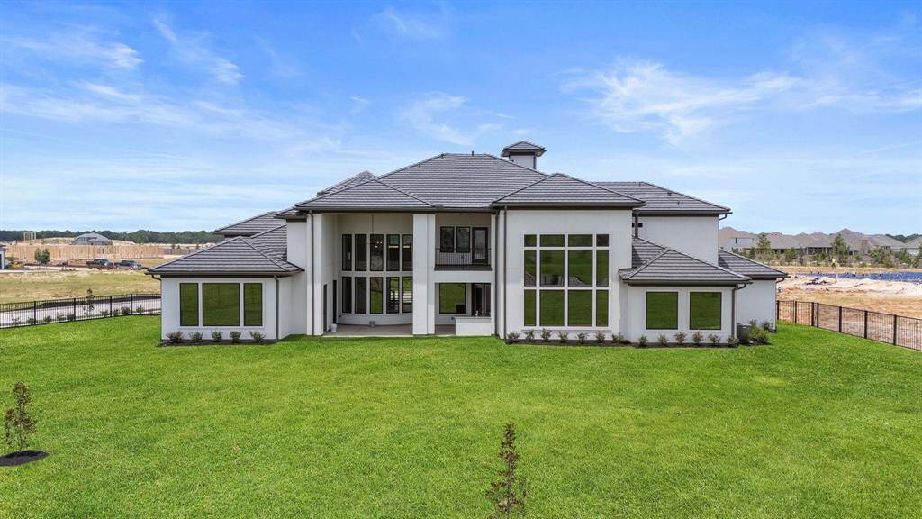 Step into a spacious backyard that offers endless possibilities for relaxation, play, and entertaining.