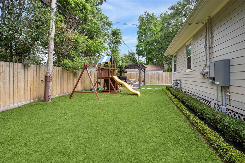 Plenty of yard space even with the playscape and arbor!