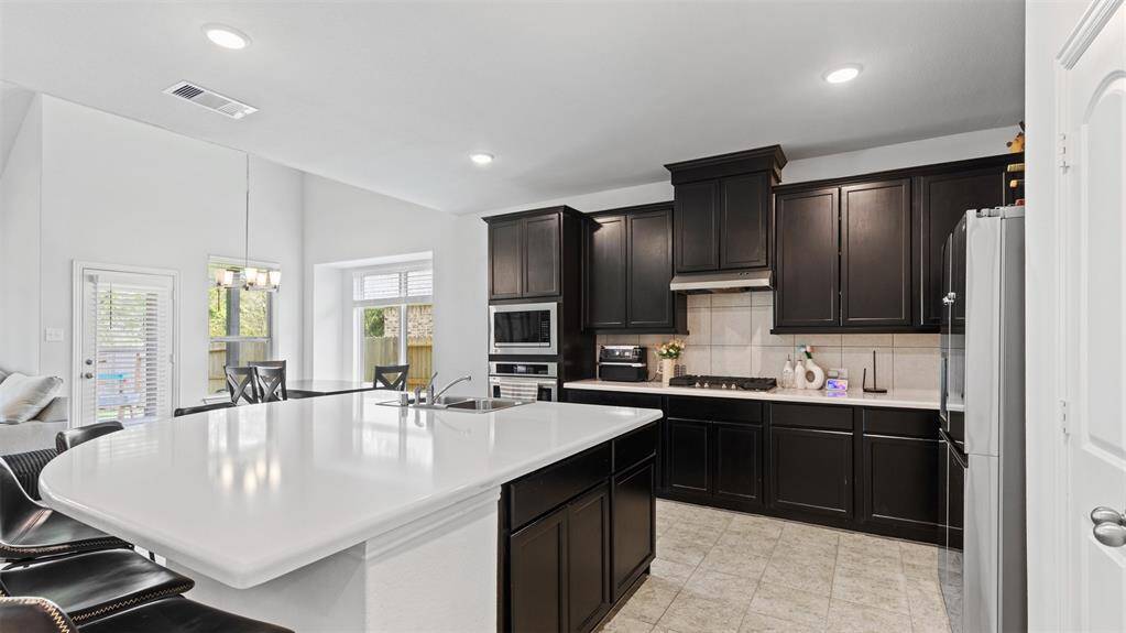 Large kitchen island perfect for additional prep space and seating