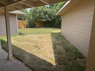 Large yard with separate dog run