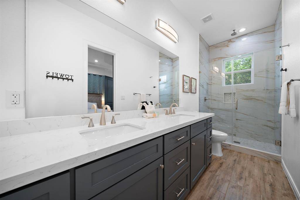 Primary bathroom boasts high end finishes