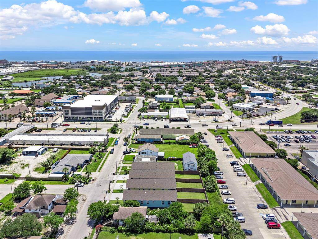 Beautiful ariel view of the Galveston Seawall and beach to the south of the house.