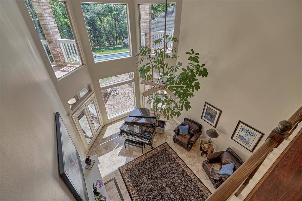 Scenic views of the backyard oasis through the two-story living room windows!