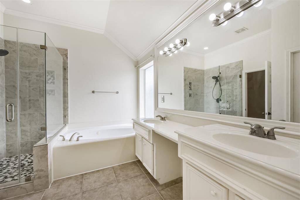Master bath with double sink and shower
