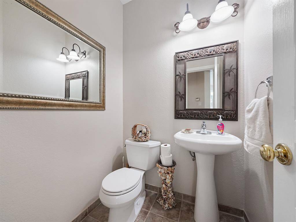 Half bathroom downstairs is perfect for guests!