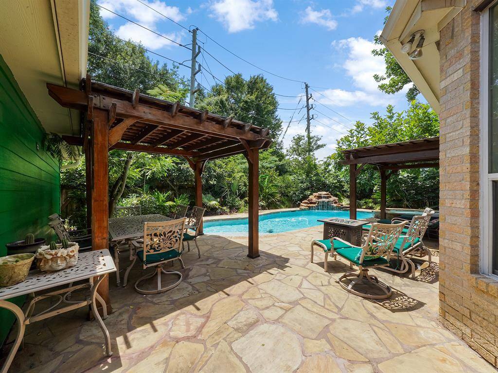 Escape to your own private paradise with this stunning home featuring a true backyard oasis! Imagine lounging by the sparkling pool, shaded by not one, but *two* elegant pergolas. This is the perfect setting for relaxation, entertaining, and creating lasting memories.