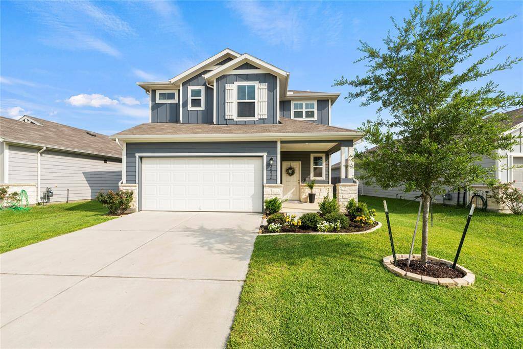 Charming front porch, perfect spot to greet family and friends