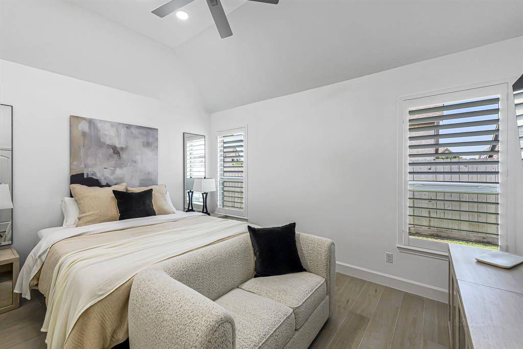 Let your cares melt away in this soothing primary retreat, where comfort meets tranquility. Spacious and serene, this bedroom offers the perfect setting to recharge at the end of the day.